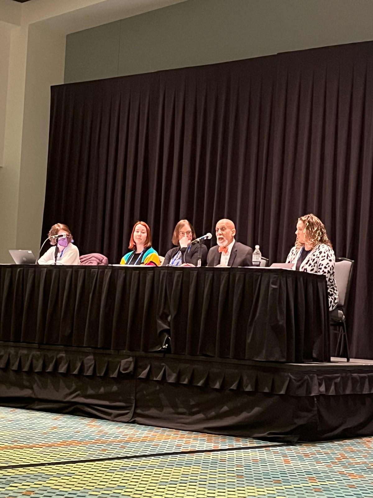 Dr. Frederick Tyson speaking on a scientific panel